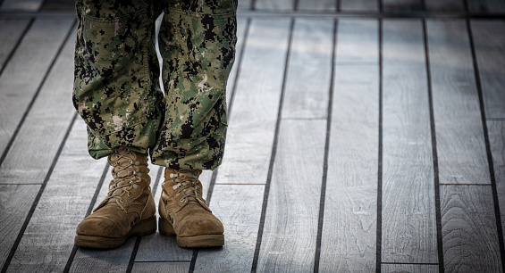 A soldier stands at the ready.